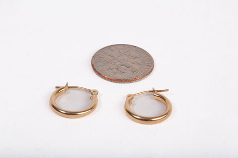 Ladies 14k Yellow Gold Small Huggie Earrings
