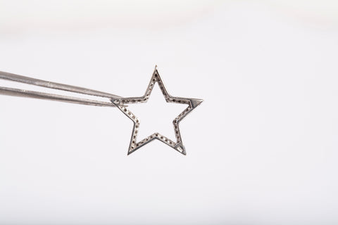 Ladies 10k White Gold Moissanite Star Medium Pendant