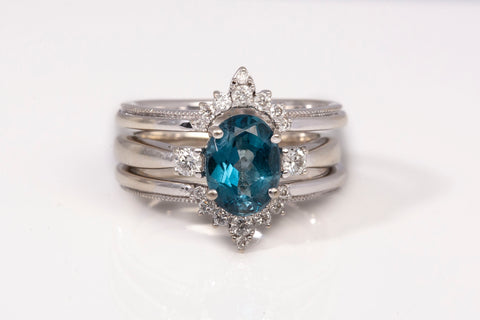 Ladies 10k White Gold Blue Topaz Ring w/14k White Gold Diamond Enhancer 0.24CTW